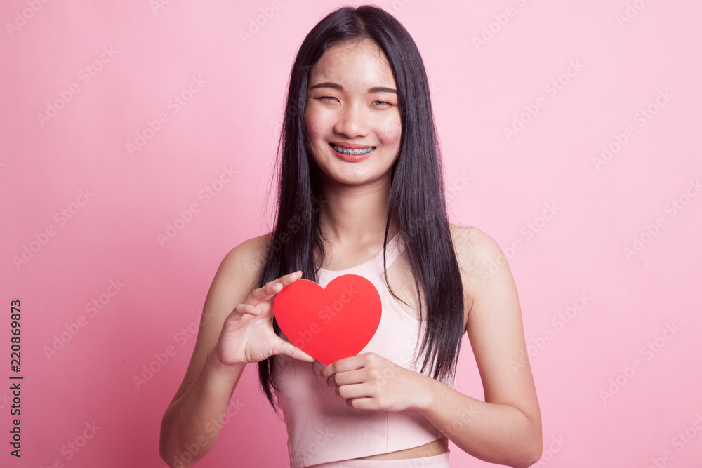 Asian woman with red heart. Asian woman with red heart.