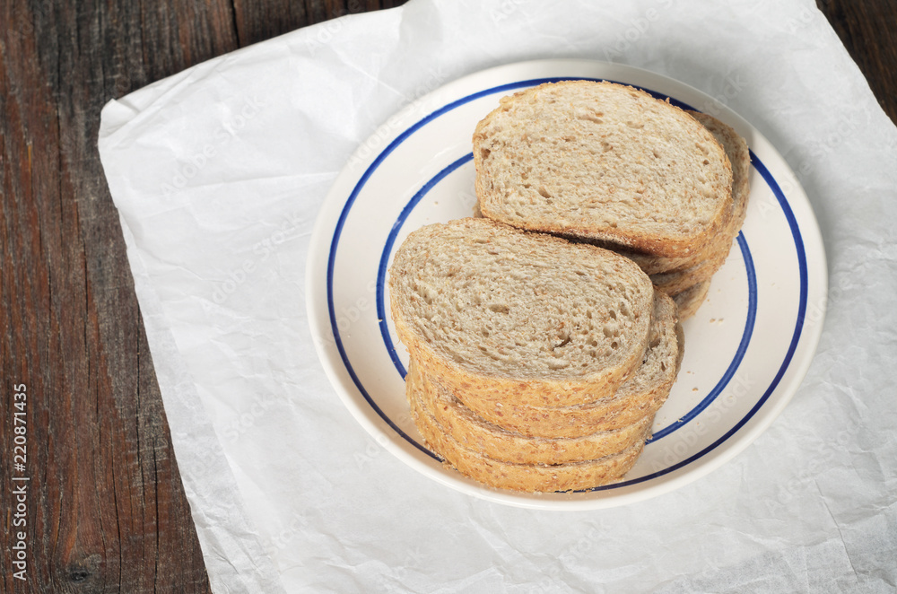 Wheat bread with bran on table Wheat bread with bran on table