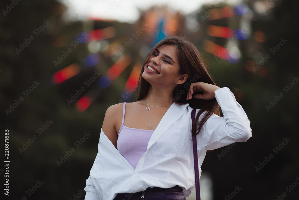 Fototapeta premium Happy woman in lunapark