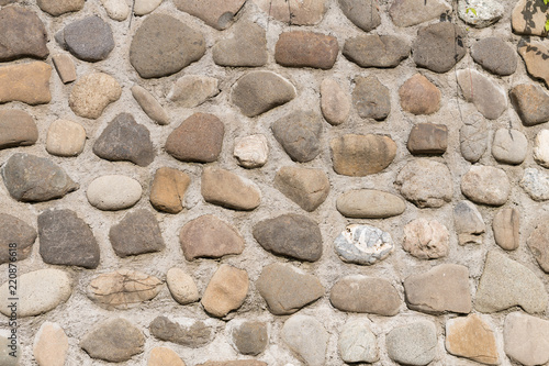 Old round stone wall background