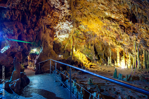 The magnificent and majestic caves of Diros in Greece. A spectacular sight of stalacites and stalagmites which took millions of years to form.The cave is located underground and can be viewed by boat. photo