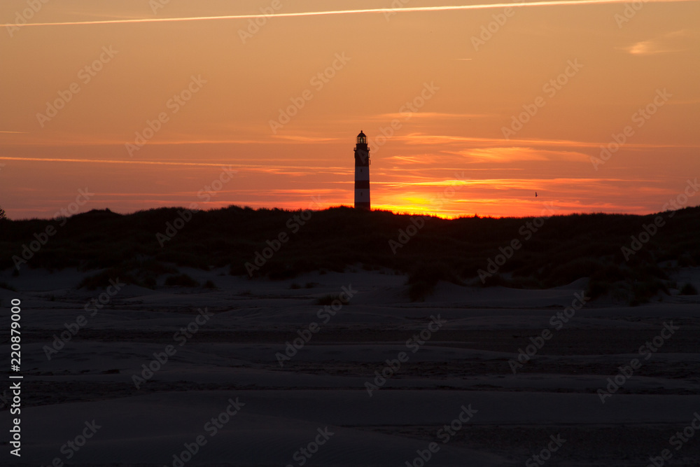Sunset behind lighthouse