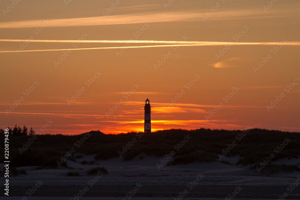 Sunset behind lighthouse