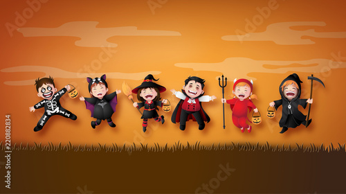 children in halloween costumes.