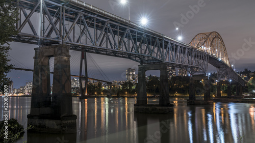 Patullo Bridge, Surrey, British Columbia, Canada. Long exposure of the bridge over the water. Sky Train Bridge.