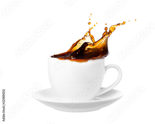 Coffee splash out of a cup isolated on white background.