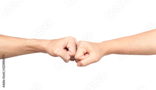 Hands giving a fist bump on white background