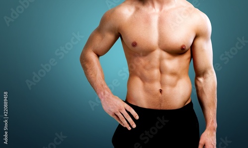 Fotografie Cropped image of fit muscular body of sportsman