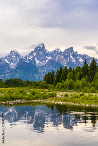 grand teton national park on the day with reflection in river. © checubus