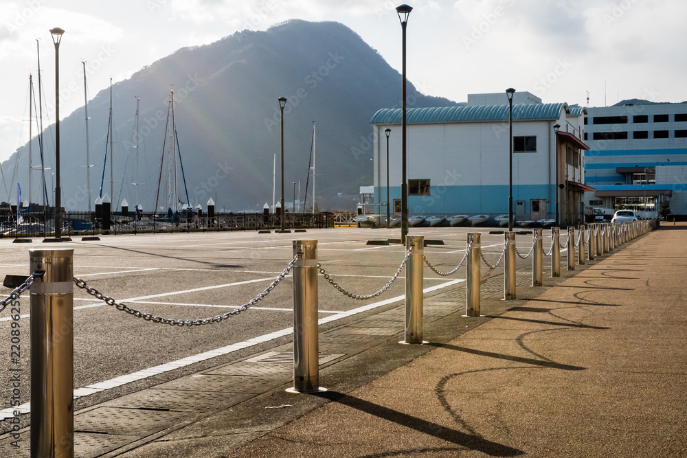 Obraz premium Beppu.Oita.Japan.JANUARY,30,2018.In the cold weather, the dockside. Have a quiet atmosphere from another season. To be crowded with crowds and activities by the sea.