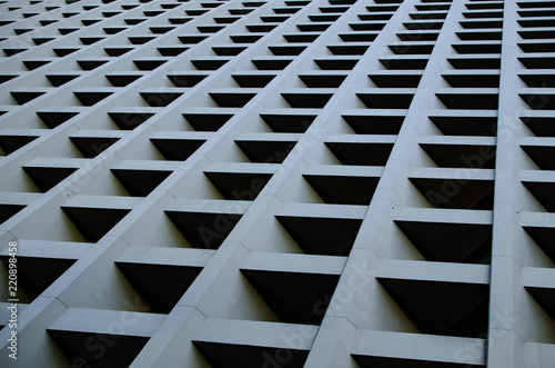 geometrical facade of grey building