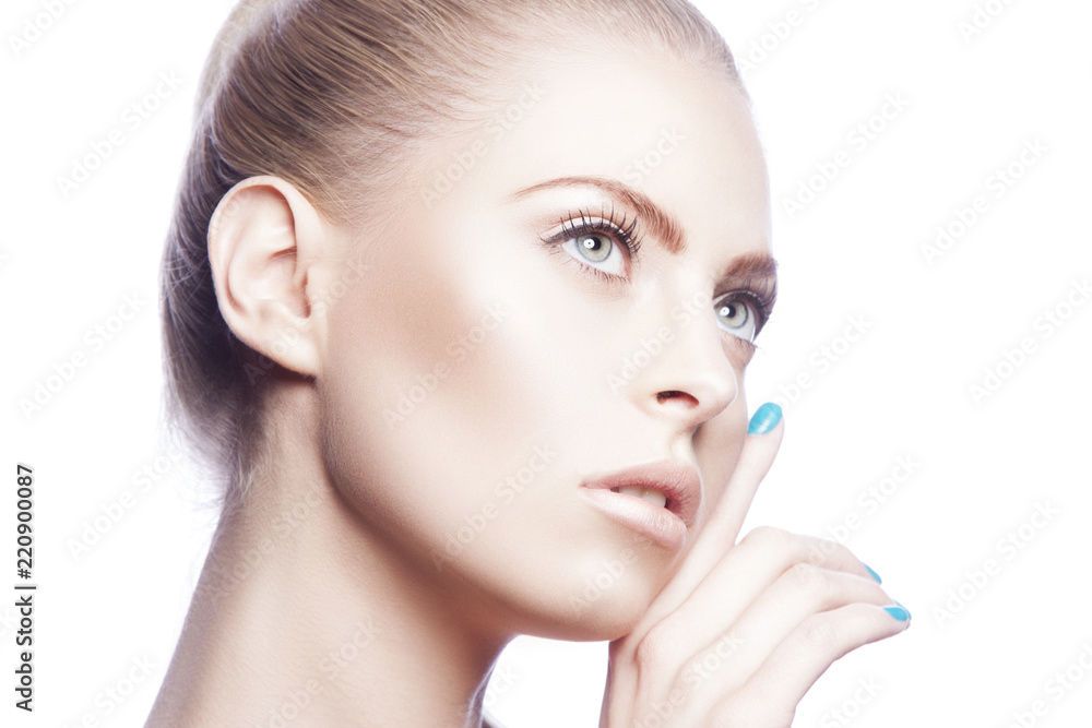 Girl beauty portrait. Perfect clean fresh skin, natural nude make-up touching cheek, blond hair. Skincare facial treatment spa concept. White background Girl beauty portrait. Perfect clean fresh skin, natural nude make-up touching cheek, blond hair. Skincare facial treatment spa concept. White background