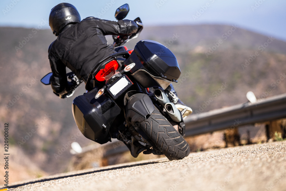 Motorcycle Rider In The Corner From Behind Motorcycle Rider In The Corner From Behind