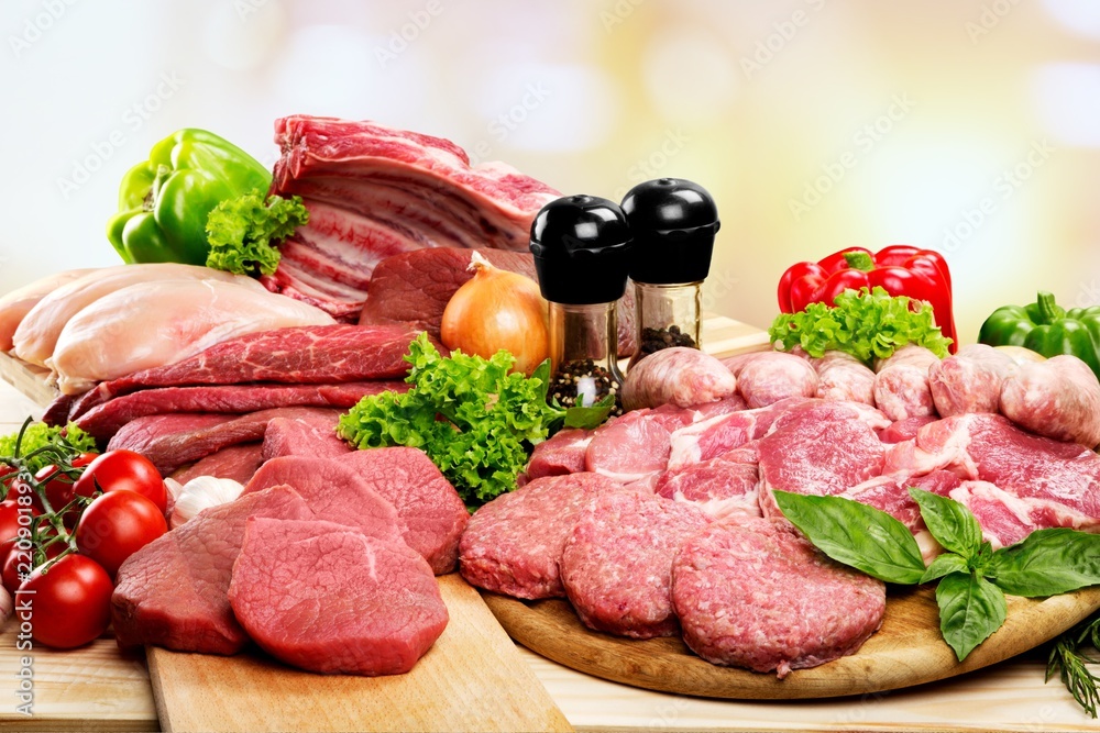 Fresh Raw Meat Background with vegetables Fresh Raw Meat Background with vegetables