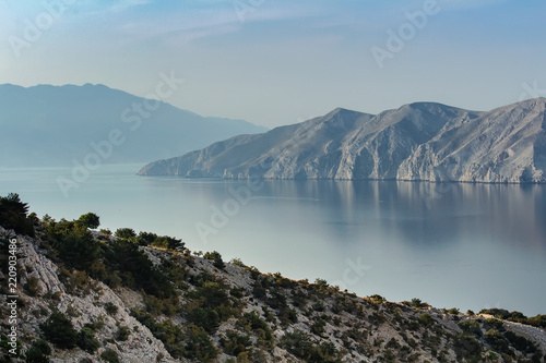 Nice calm sea with cliffs and hills, island Krk, Croatia