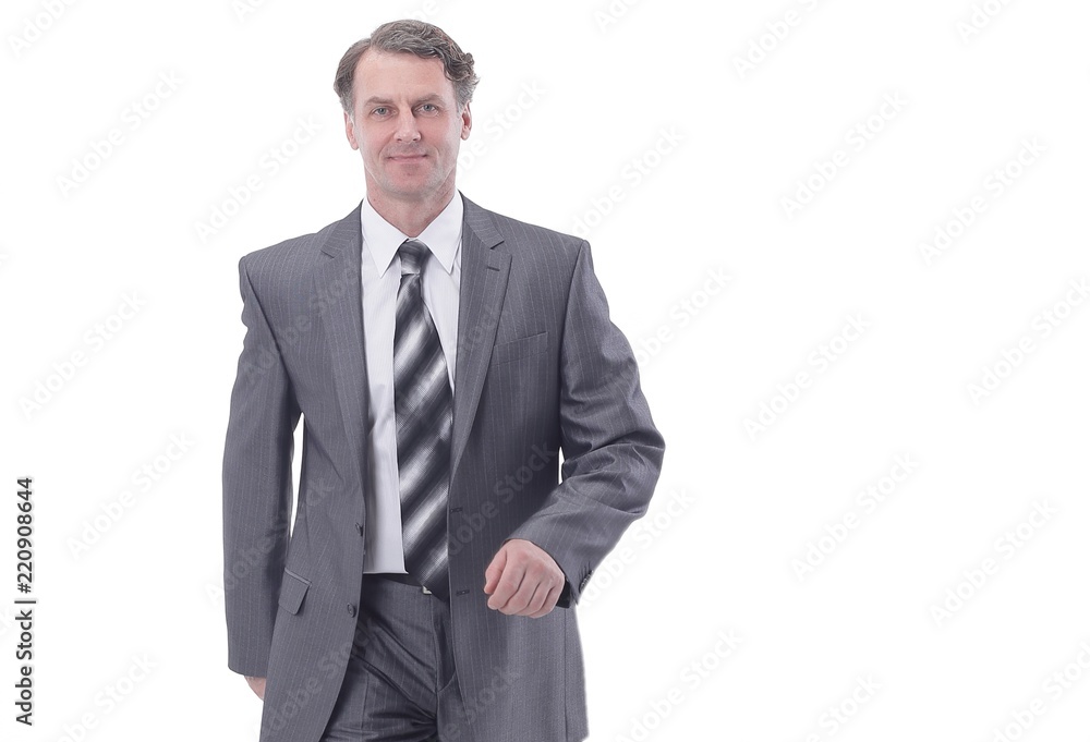 in all growth.a successful businessman, confidently striding forward. in all growth.a successful businessman, confidently striding forward.