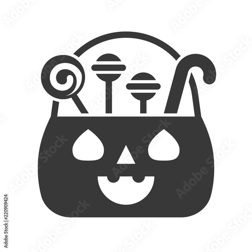 sweets and candy in jack o lantern basket, Halloween solid icon