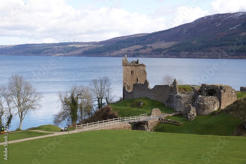 The ruins of the castle of Urquhart in Scotland on the shores of Lake Lochness, the castle stood in the middle of the green remained only more a tower