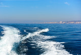 Wavy trail on Mediterranean Sea after vessel,  Spain