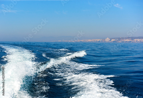 Wavy trail on Mediterranean Sea after vessel, Spain