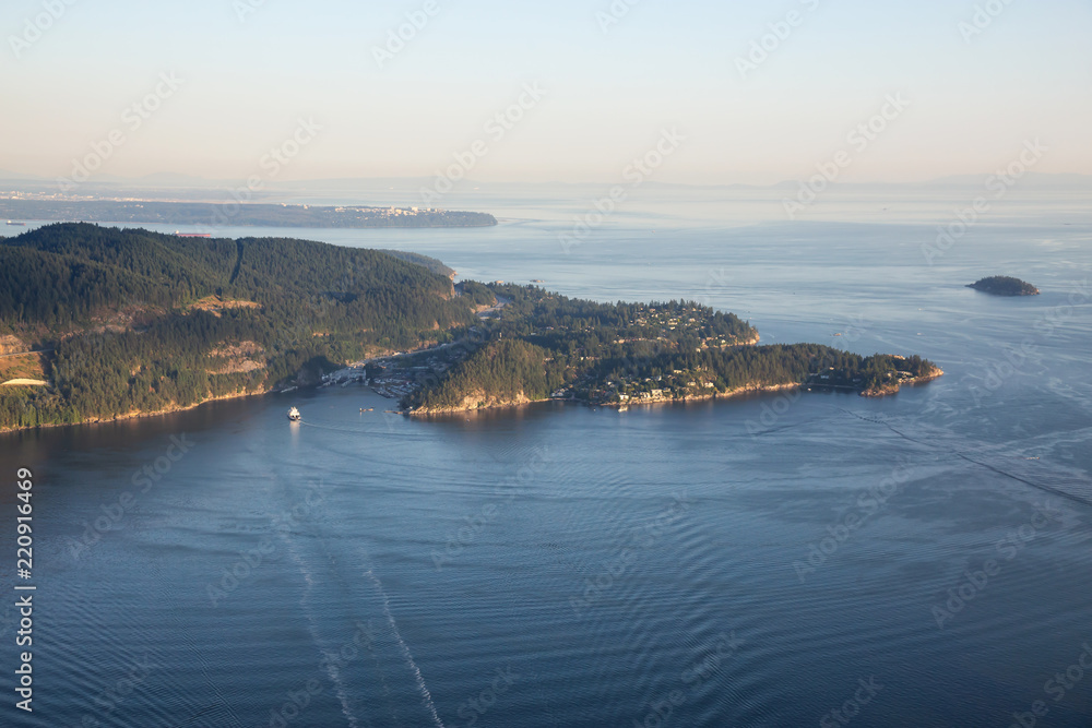 Aerial view of Horseshoe Bay during a sunny summer evening. Taken in Howe Sound, West Vancouver, BC, Canada.