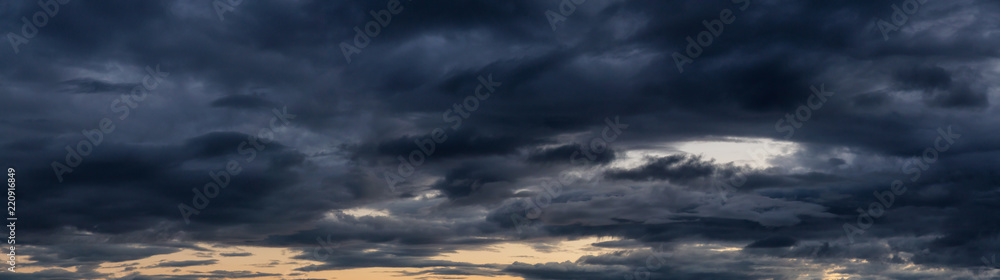 Striking panoramic cloudscape during a vibrant summer sunset. Taken in British Columbia, Canada. Striking panoramic cloudscape during a vibrant summer sunset. Taken in British Columbia, Canada.