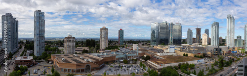 Metrotown, Burnaby, Vancouver, BC, Canada - June 26, 2018: Aerial view of Metropolis Shopping Mall during a vibrant summer day. photo