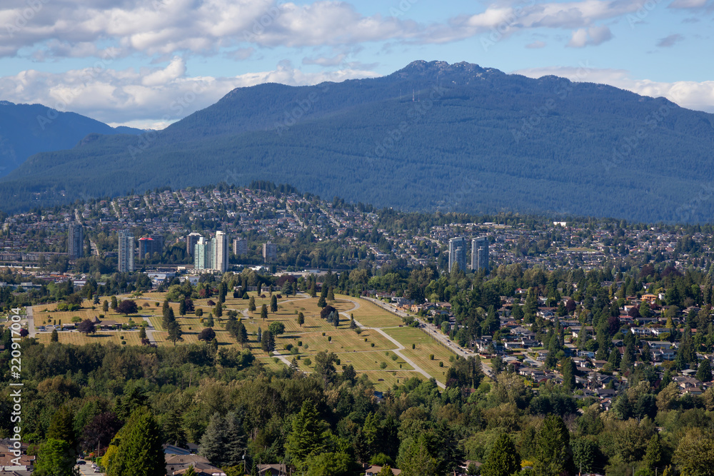 Aerial view of the modern city during a vibrant summer day. Taken in Burnaby, Greater Vancouver, BC, Canada.