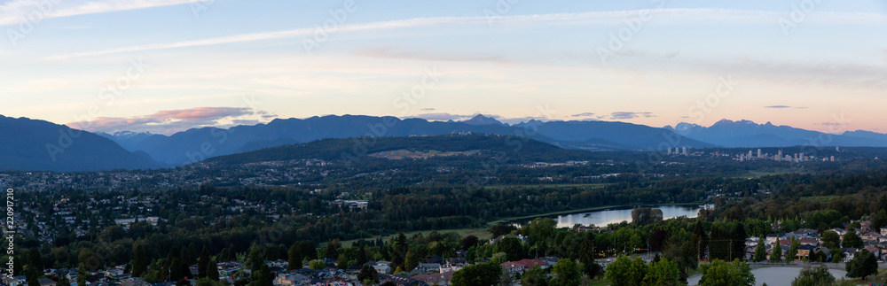 Aerial panoramic view of the modern city during a vibrant summer sunset. Taken in Burnaby, Greater Vancouver, BC, Canada.