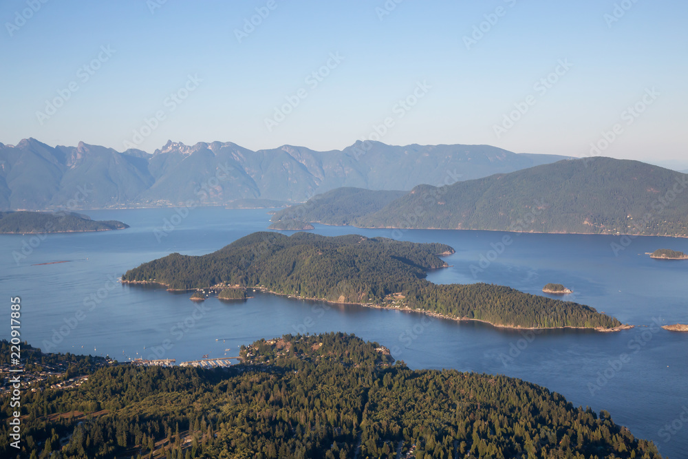 Aerial view of Gibsons, Keats Island and Howe Sound during a vibrant sunny summer day. Located in Sunshine Coast, Northwest of Vancouver, BC, Canada.