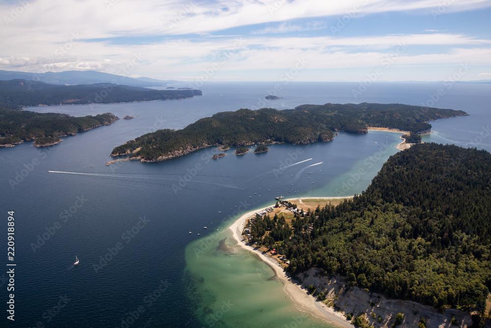 Aerial view of Thormanby Island during a sunny summer day. Taken in Sunshine Coast, BC, Canada.