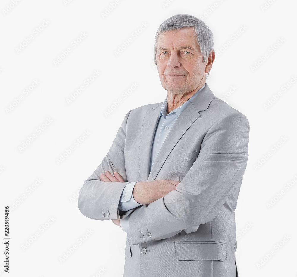 senior businessman standing with arms crossed on white background senior businessman standing with arms crossed on white background