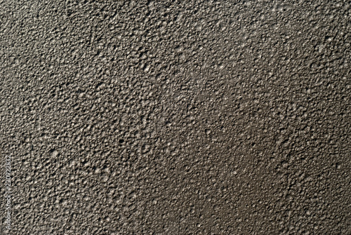 background, texture - the lunar surface, top view (in fact - wet clay with traces of rain drops)