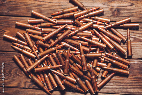 Fototapeta Naklejka Na Ścianę i Meble -  Bullets on wooden background.