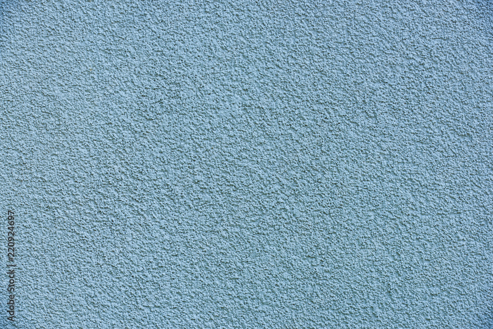 close-up view of light blue concrete wall texture close-up view of light blue concrete wall texture