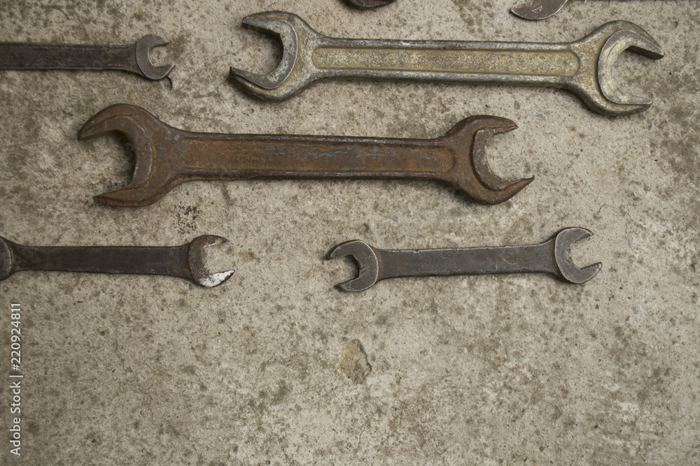 spanners on a concrete background