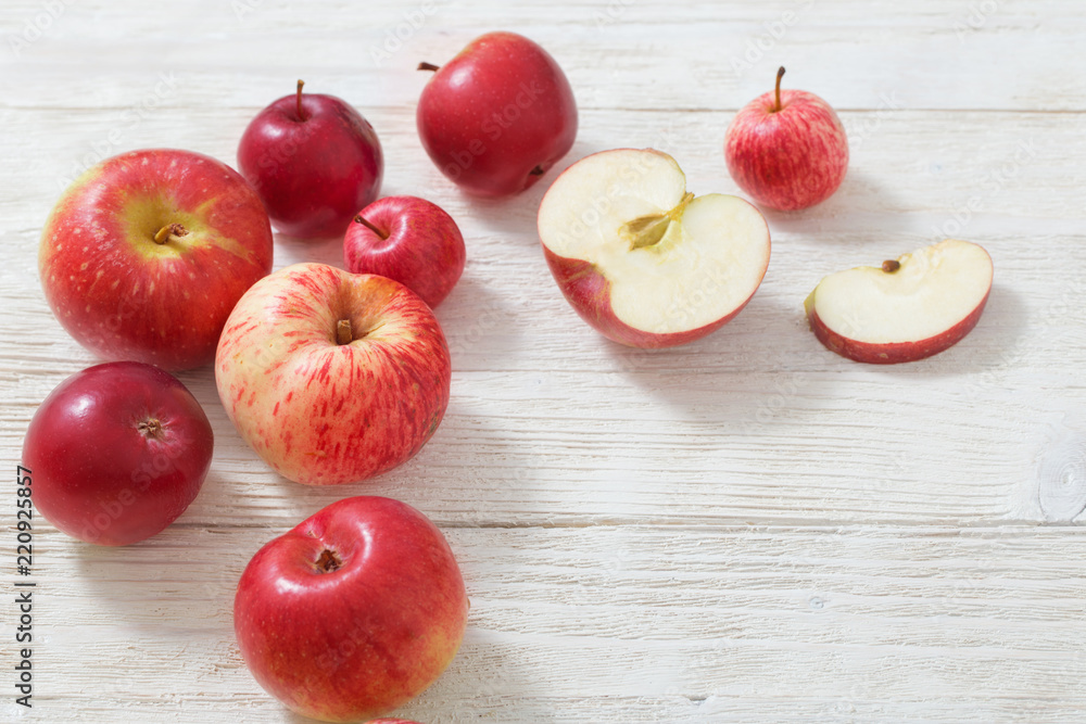 apples on wooden white background apples on wooden white background