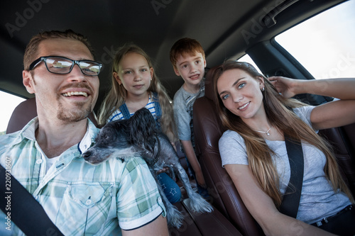 close up. happy family travels in a comfortable car