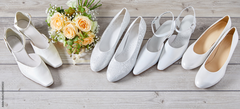 Four pairs of different white wedding shoes Four pairs of different white wedding shoes