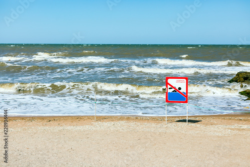 Fototapeta Naklejka Na Ścianę i Meble -  Swimming is forbidden, signboard, storm, Russia, the Sea of Azov