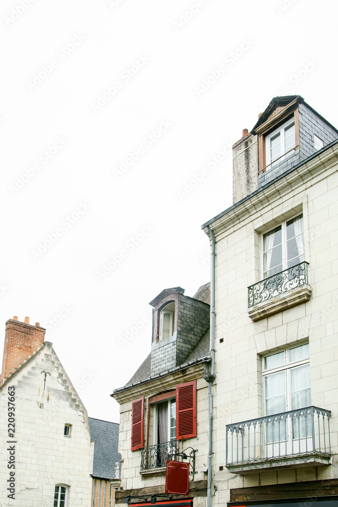 Fototapeta premium Picture of a street in old french town with traditional architecture