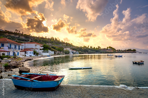 Colorful fishing boats anchored in the harbor of Koroni, Greece