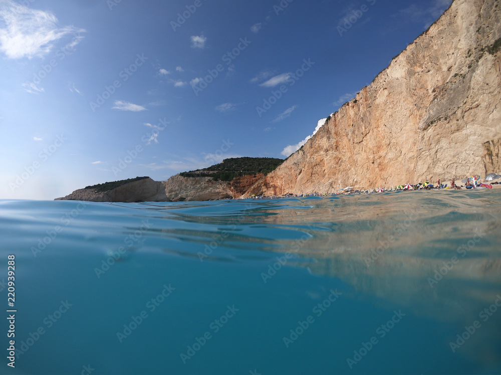Fototapeta premium Sea level underwater photo of tropical caribbean paradise turquoise beach in exotic island located in an ocean