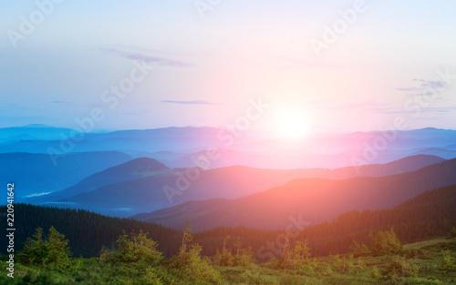 Bright dawn over mountain peaks  beauty and purity of nature