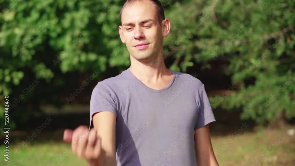 Portrait of man holding bitcoin in his hand. Portrait of man holding bitcoin in his hand.