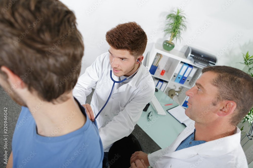 Fototapeta premium internist doctor learning with experienced professor