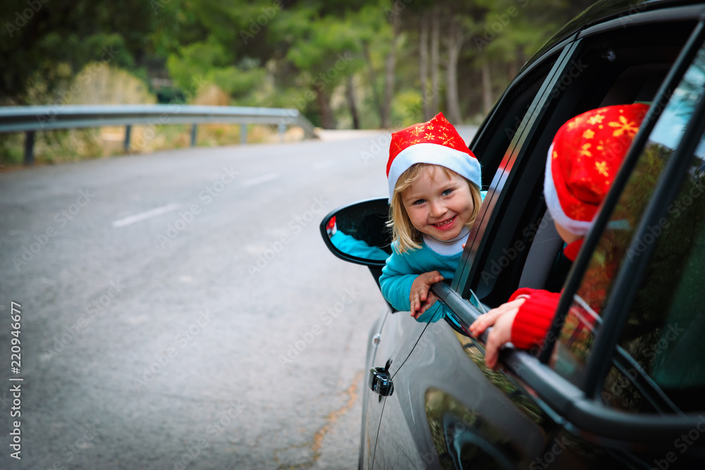 christmas car travel- happy kids travel in winter