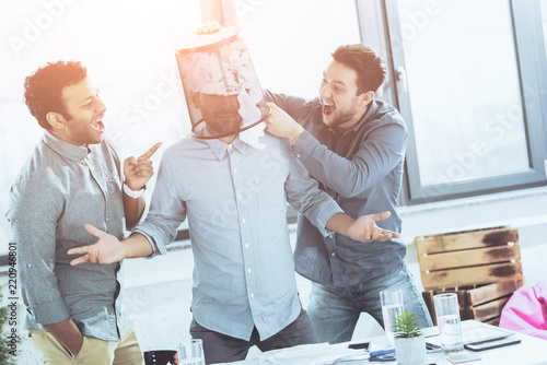 portrait of young business team having fun in office, business teamwork