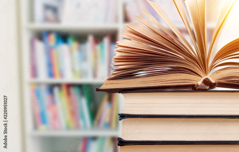 Old stacked books on background Old stacked books on background