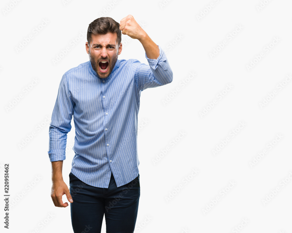 Young handsome man over isolated background angry and mad raising fist frustrated and furious while shouting with anger. Rage and aggressive concept. Young handsome man over isolated background angry and mad raising fist frustrated and furious while shouting with anger. Rage and aggressive concept.